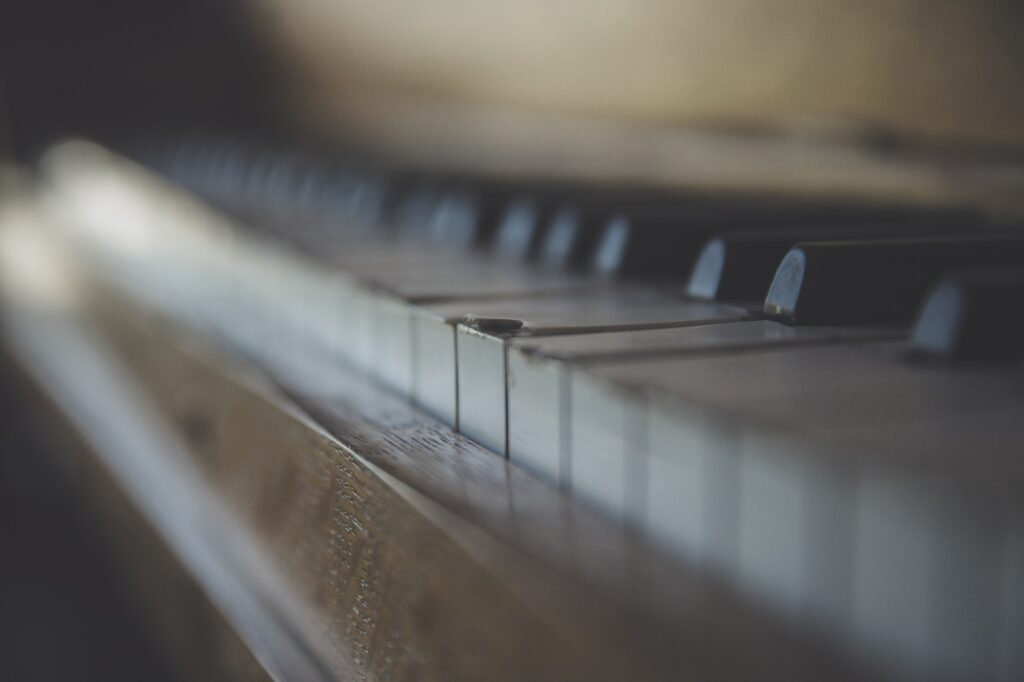 brown wooden framed piano