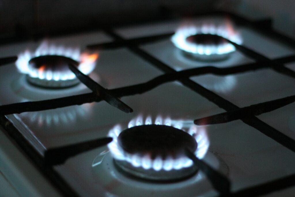 black gas stove with white and black gas stove