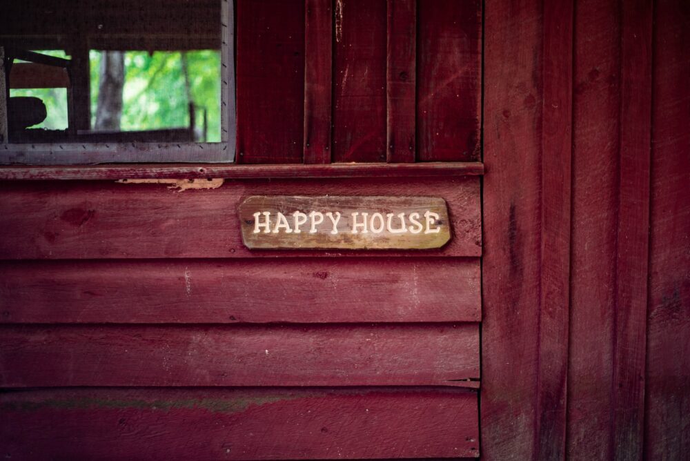 Happy House wooden signage
