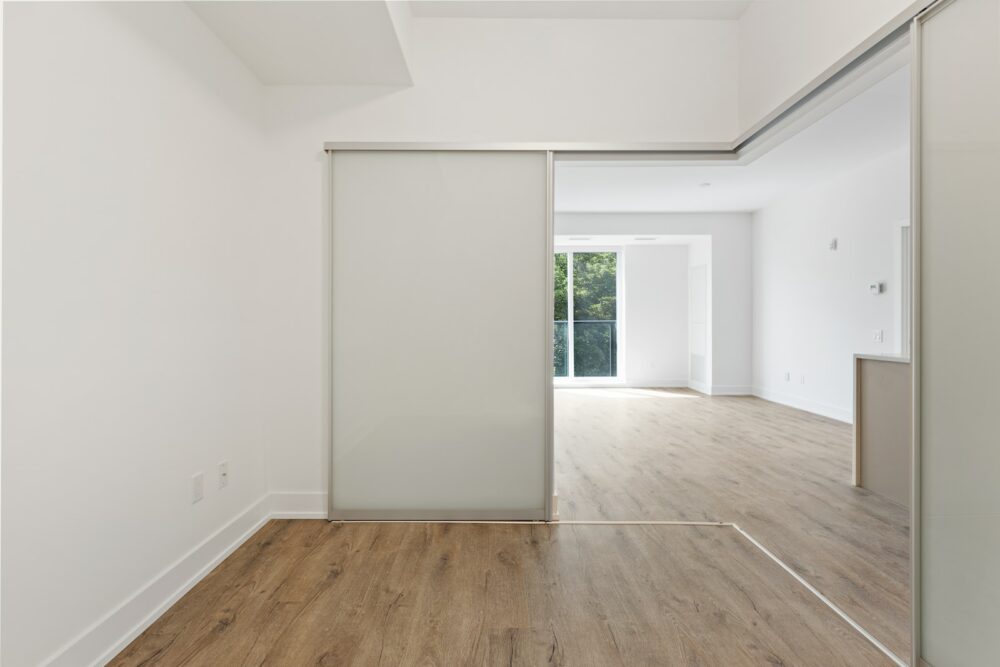 white wooden door near brown wooden parquet floor